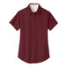 A Port Authority extra small women's short sleeve dress shirt in burgundy with light stone accents.