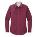 A Port Authority women's long sleeve burgundy dress shirt in a white and light stone color.