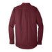 A Port Authority burgundy long sleeve poplin dress shirt.