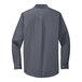 A Port Authority steel gray and light stone long sleeve dress shirt with a button up.