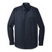 A Port Authority river blue long sleeve poplin dress shirt.
