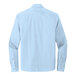 A Mercer+Mettle unisex light blue long sleeve button down dress shirt.