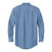 A faded blue denim button-down shirt by Port & Company.