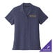 A Port Authority women's short sleeve navy shirt with gold embroidery of a logo.