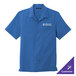 A Port Authority True Blue short sleeve staff shirt with a logo on the chest.