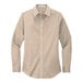 A medium tan Port Authority long sleeve poplin dress shirt for women.