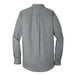 A Port Authority Gusty Gray long sleeve button down dress shirt.