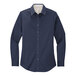 A Port Authority navy and light stone long sleeve poplin dress shirt for women.