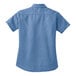 A Port & Company faded blue denim button-down shirt for women.