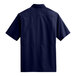 A back view of a navy Port Authority short sleeved shirt.