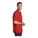 A man wearing a Port Authority rich red short sleeve performance shirt.