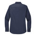 A Port Authority women's navy long sleeve dress shirt with light stone accents.