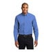 A man wearing an ultramarine blue Port Authority long sleeve poplin dress shirt.
