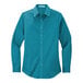 A teal green Port Authority women's long sleeve poplin shirt.