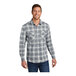 A man wearing a gray and cream plaid Port Authority long sleeve flannel shirt.