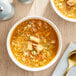 A bowl of Gumbo Chicken Sausage soup with rice and vegetables.