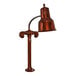 A Hanson Heat Lamps smoked copper heat lamp with a metal shade and base.