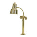 A close-up of a brass Hanson Heat Lamp with a brass bottom.