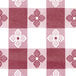 A red and white checkered pattern on a Intedge vinyl table cover.