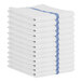 A stack of white Monarch Brands bar towels with blue stripes.