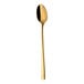 A Sola the Netherlands stainless steel iced tea spoon with a gold handle.