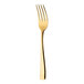 A close-up of a Sola Durban Gold stainless steel fork with a white handle.