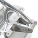 A Fama Electric Hard Cheese Grater with a metal handle.