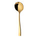 A close-up of a Sola Durban Gold stainless steel round bowl soup spoon with a long handle.