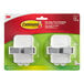 A package of 2 white plastic 3M Command Broom Grippers with grey parts.