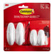 A package of white 3M Command® designer hooks.