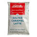 A white bag with red and blue text that says "Dr. Smoothie Cafe Essentials Salted Caramel Latte"