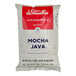 A white bag of Dr. Smoothie Cafe Essentials Mocha Java Beverage Mix with red and white text.