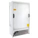 A white refrigerated air curtain merchandiser with a glass door open.