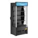 A black refrigerated air curtain merchandiser with multiple shelves and a customizable display panel at the top.