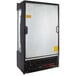 An Avantco black and white refrigerated air curtain merchandiser with a door open.