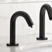 A Waterloo matte black automatic soap dispenser on a white counter.