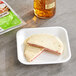 A plate with a Cheesewich Salami and Pepper Jack Cheese sandwich.