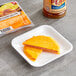 A white package of a Cheesewich Salami and Cheddar Cheese sandwich.