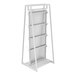 A white display rack with shelves on it.