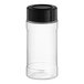 A clear plastic round spice container with a black lid.