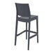 A dark gray Siesta Maya bar stool with a black backrest.