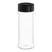 A clear plastic round spice container with a black lid.