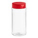 A clear plastic container with a red lid containing 16 oz. Round Plastic Spice Containers and 63/485 Red Induction-Lined Dual Flapper Lids.