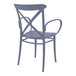 A dark gray Siesta Cross XL outdoor dining arm chair with a cross back.