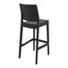 A Siesta Maya black bar stool with a backrest.