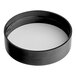 A black round plastic spice container with a white circular lid.