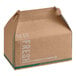 A brown cardboard Barn Take Out Lunch Box with green writing on it.