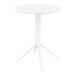 A Siesta Sky white round table with a white surface and metal legs.