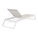 A Siesta Tropic white resin outdoor chaise lounge with a taupe sling on a white background.