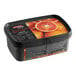 A black container of Andros Chef 100% Blood Orange Puree with a label.